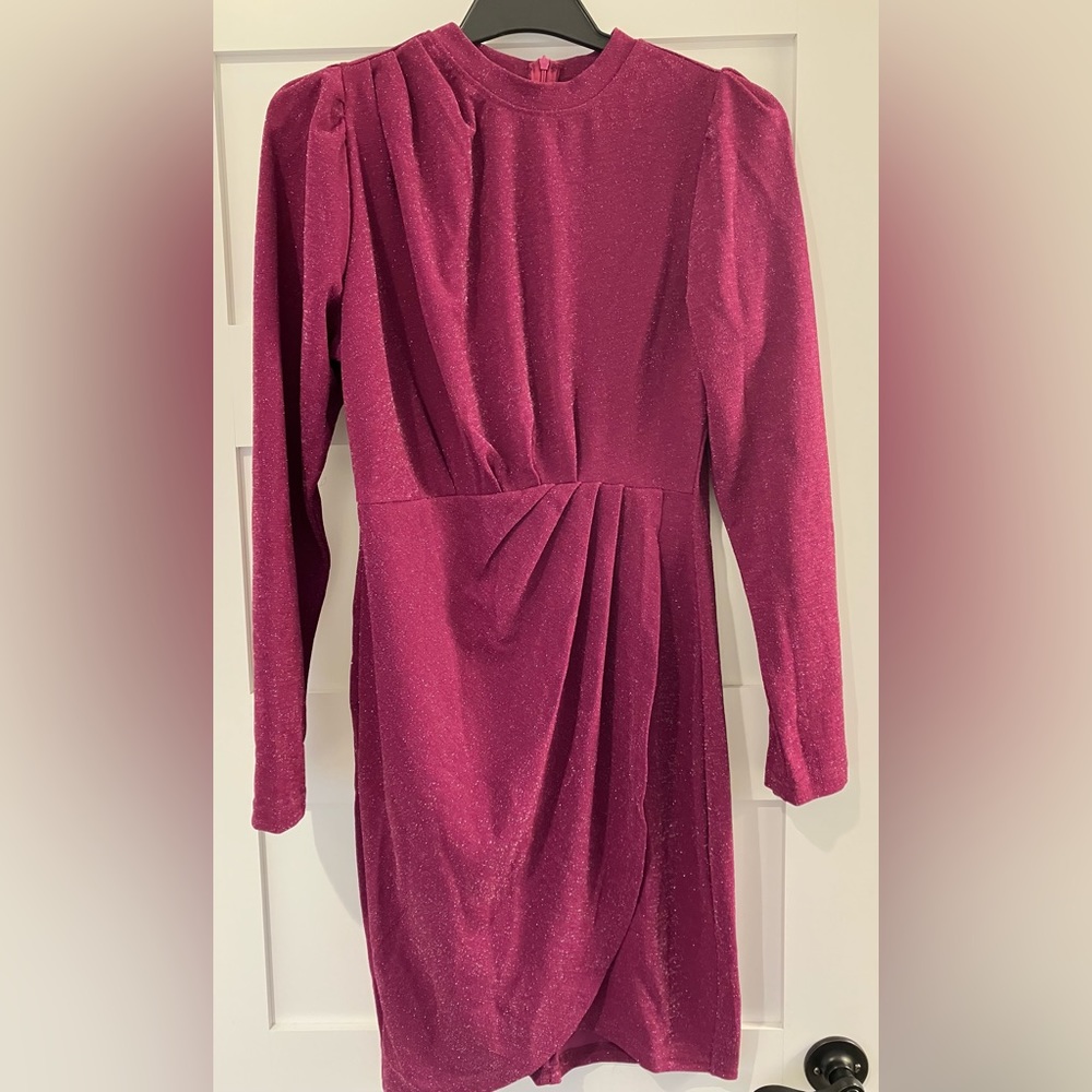 Long sleeve sparkly dress. Perfect for holidays! Stretchy material.